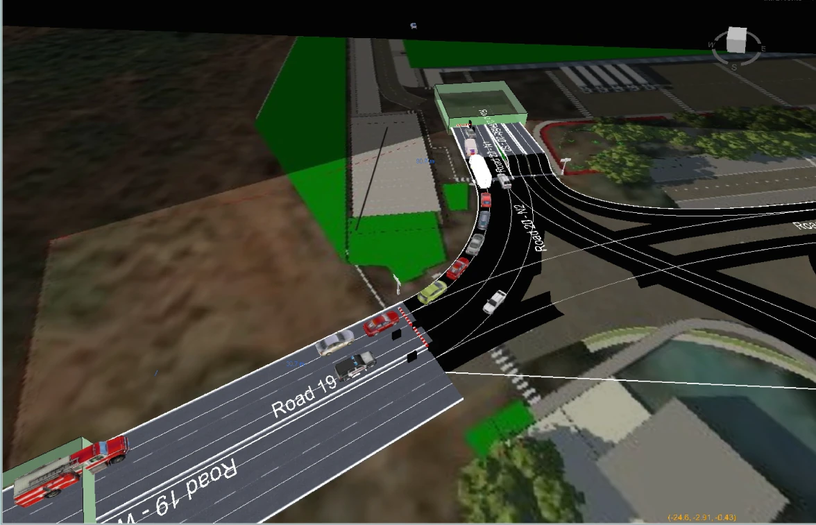 Autodesk InfraWorks traffic simulation showing vehicles and entrance lanes at the Bhiwandi logistics park